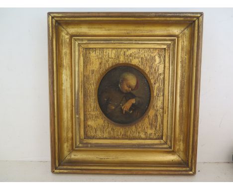 An oil on wooden panel of a Continental Gentleman smoking a pipe 18th/19th century - in a gilt frame - 10 cm x 9 cm 