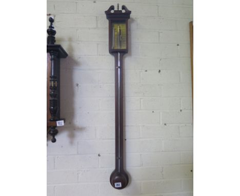 A George III style Thomas Wright mahogany stick barometer with brass dial and slider - Height 96 cm  
Condition report: In go