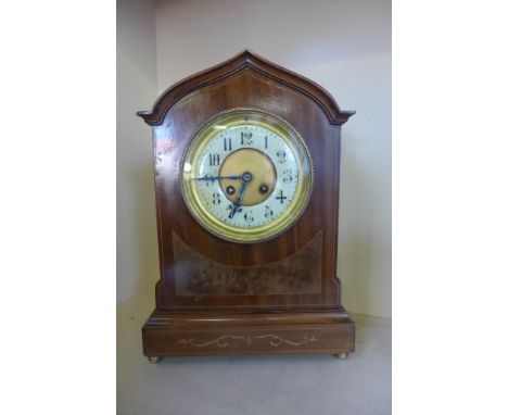 An eight day French walnut case mantel clock 
Condition report: Working 