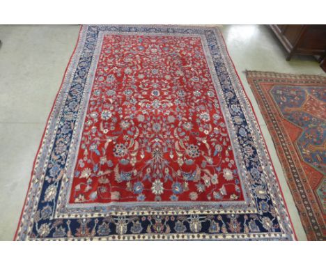 A red ground very fine Persian carpet - 2.80 m x 1.82 m