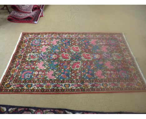 A red ground fine handmade Persian Baktiar carpet - 2.50 m x 1.55 m 