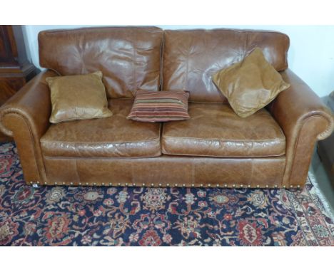 A Wade Upholstery leather Morgan two seater sofa 2m wide x 97cm deep x 91cm tall