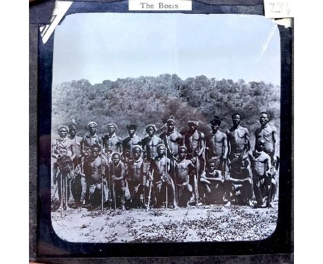 Collection of 80 magic lantern slides housed in two card drawers, including 27 coloured slides from the Slum Life series; 43 