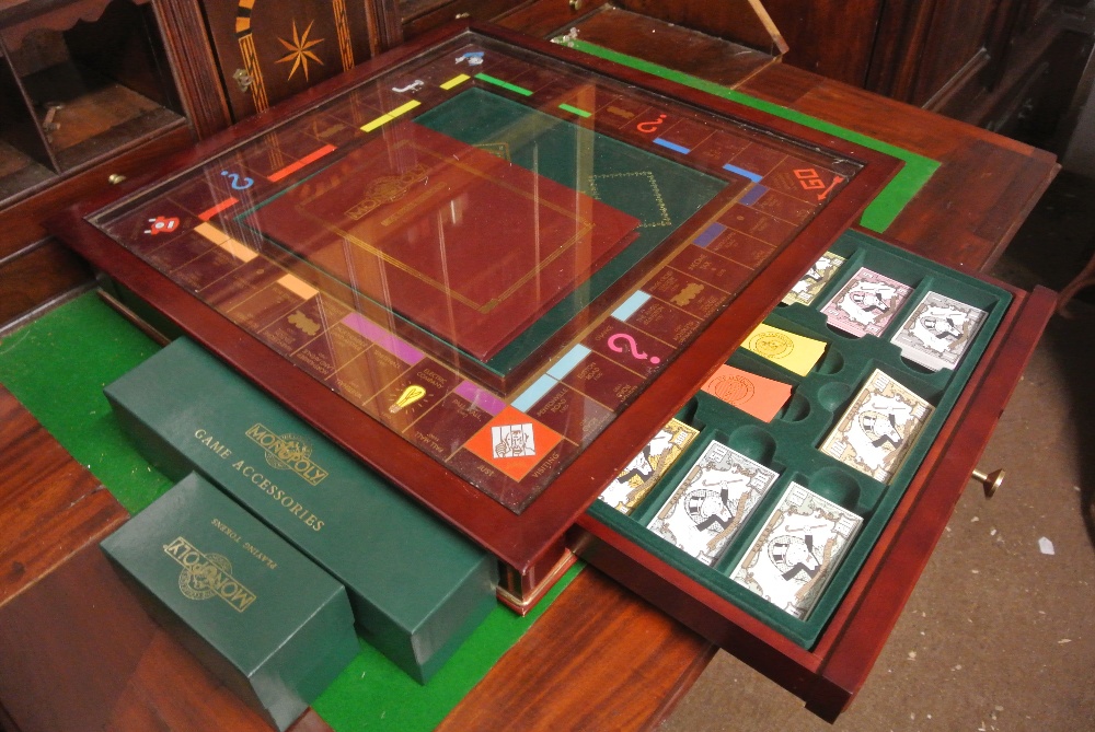 COLLECTABLES A limited edition deluxe Monopoly game, the board is a