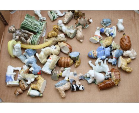 A collection of Wade Whimsies figures including Lady &amp; Tramp, Policeman etc  excellent condition