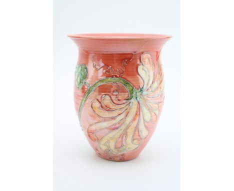 Lise B Moorcroft coral coloured floral vase, 15cm tall.  In good condition with no obvious damage or restoration.