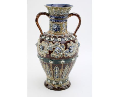 George Tinworth for Doulton Lambeth two handled vase with moulded relief sections, dated 1874, 28.5cm tall (restored). Displa