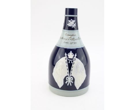 Copeland Spode Coronation Whisky Decanter with King George and Queen Mary in low relief, set on cobalt blue background, 21cm 