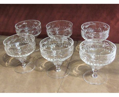 Eleven crystal glass champagne saucers 