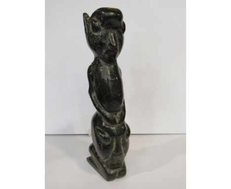 A Neolithic culture (7000-2000 B.C) green nephrite Jade magnetic alien tolem god, the lower part of the body of alien form. T