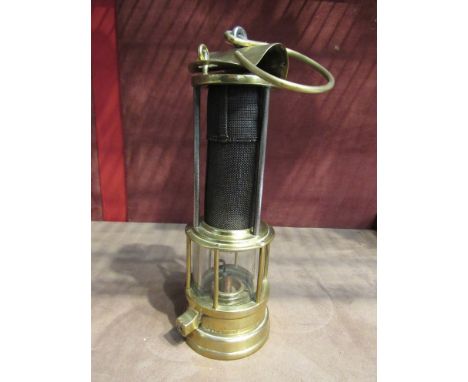 Clanny miners lamp, with flip top and gauze protected by three rods, stamped E Thomas, Aberdare  