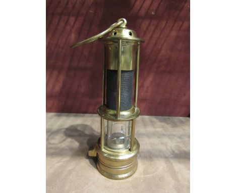 Williamson type miners lamp, all brass stamped 'Naylor Wigan' top of the gauze protected by brass top, 21cm tall  