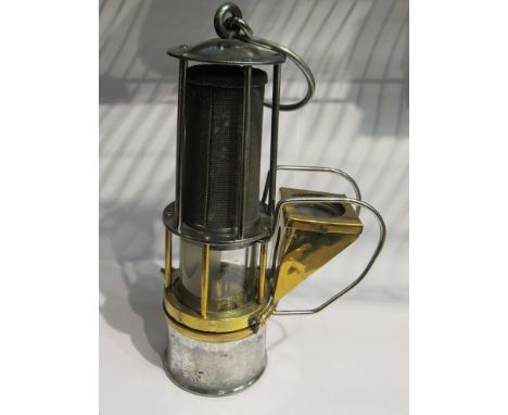 Brass and steel miner's lamp with exposed gauze, brass surrounded lens attached to side, 25cm tall  