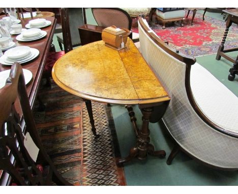 A Victorian walnut Sutherland table with turned columns, ceramic bases, 91cm long