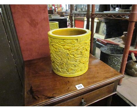 A Chinese ceramic jardiniere with high relief dragon pattern, 20cm tall 20.5cm diameter 