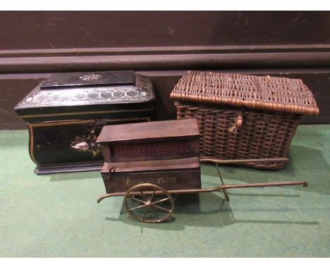 A Victorian papier maché tea caddy, small wicker caddy and musical organ