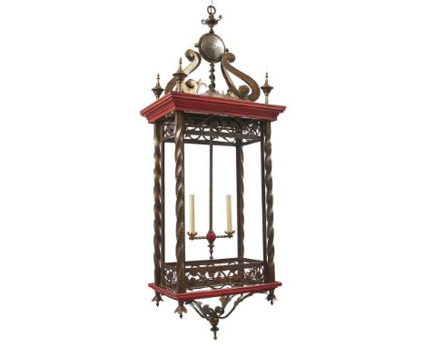 A LARGE AND ORNATE IRON, BRASS AND PAINTED WOOD LANTERN BELGIUM, CIRCA 1900 The moulded wood top and base decorated red above