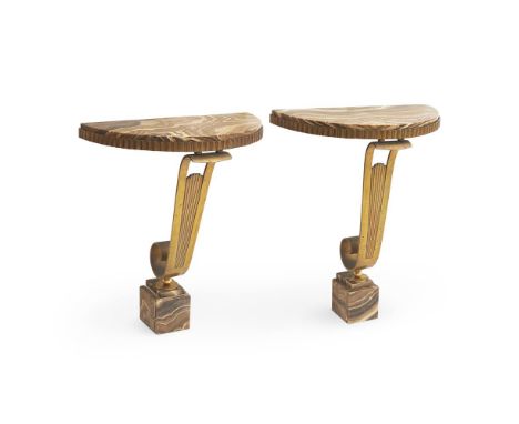 A PAIR OF FRENCH ART DECO GILT IRON CONSOLE TABLES CIRCA 1930, IN THE MANNER OF RAYMOND SUBES Each with banded onyx top and p