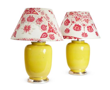 A PAIR OF CHINESE YELLOW PORCELAIN JARS FIRST HALF 20TH CENTURY Now fitted as table lamps, UK wiringthe base 38cm high, 55cm 