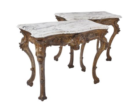 A PAIR OF ITALIAN CARVED GILTWOOD SERPENTINE CONSOLE TABLES CIRCA 1770With Breccia marble topseach 95cm high, 117cm wide, 60c