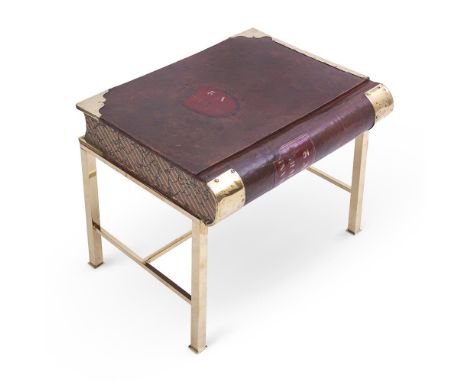 A VINTAGE LEATHER COVERED FAUX BOOK TABLE 20TH CENTURY With brass corners and later brass base, inscribed to top 'Grand Livre