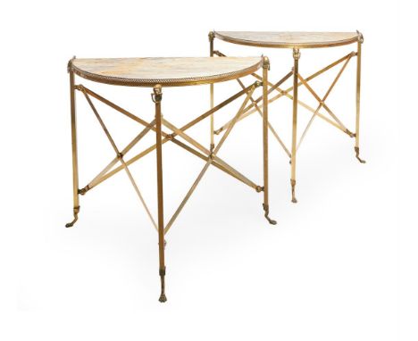 A PAIR OF GILT METAL CONSOLE TABLES IN CAMPAIGN STYLEMID 20TH CENTURY, POSSIBLY SPANISH, ATTRIBUTED TO ERAIISOf semi-elliptic