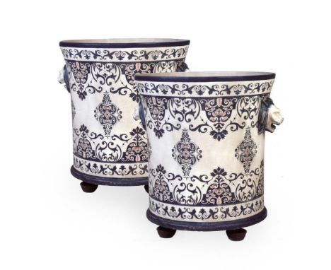 A PAIR OF MODERN ENAMELLED-IRON ORANGERY URNS OF LARGE SIZEBY GUINEVERE The enamel blue and white pattern inspired by Rouen f