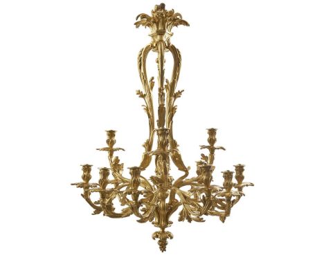 AN ORNATE LOUIS XV STYLE ORMOLU ROCOCO TWELVE LIGHT CHANDELIER FRENCH, CIRCA 1900, IN THE MANNER OF CAFFIERI With all-over ri