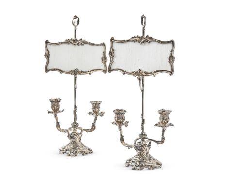 A PAIR OF FRENCH SILVER PLATED CANDELABRA IN THE LOUIS XV STYLE MID 19TH CENTURY, PROBABLY ROCOCO REVIVAL The height adjustab