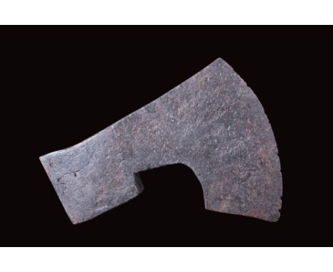 Ca. AD 900 - 1100.An iron axe head with a bearded blade, a D-shaped shaft-hole socket and a flat butt.Size: 150mm x 110mm; we