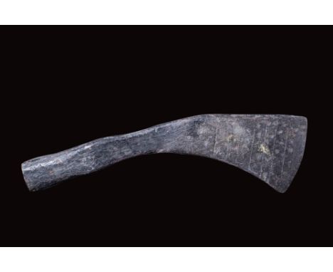 Ca. AD 900 - 1100.An iron axe head with an asymmetrical blade and a round shaft-hole socket with a hammer end.Size: 185mm x 5