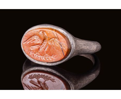Ca. AD 1 -100.An oval-shaped intaglio finely engraved with the image of an eagle, its wings spread wide in a majestic pose. T
