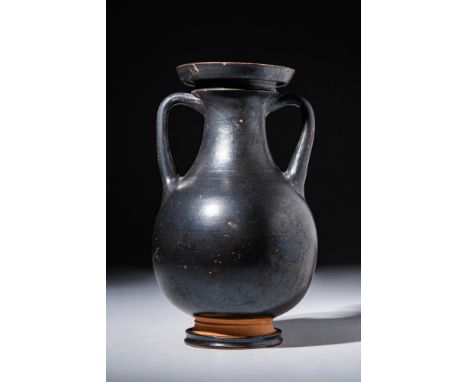 Ca. 400 - 200 BCAn Attic black glazed amphora with an apple-shaped body and a trumpet-shaped mouth. It also features two late