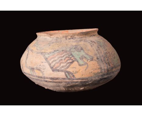 Ca. 3rd millennium BC.A biconical pottery vessel featuring a broad, tapered base and a sloped shoulder with an everted rim. T