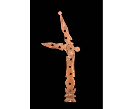 Ca. AD 100 - 300.A rare cosmetic tool, delicately carved from bone and implemented with intricate detailing on its body and t