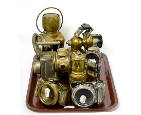 A Lucas 'King of the Road' No 630 motoring lamp, together with seven other vintage lamps including cycling (8)