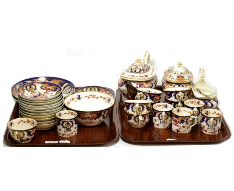 A group of 19th century Royal Crown Derby Imari wares including a tea pot with silver spout, cream, sugar, seven tea cups, fi