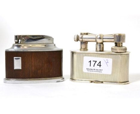 A Dunhill desk lighter, with engine turned decoration; and a Ronson example 