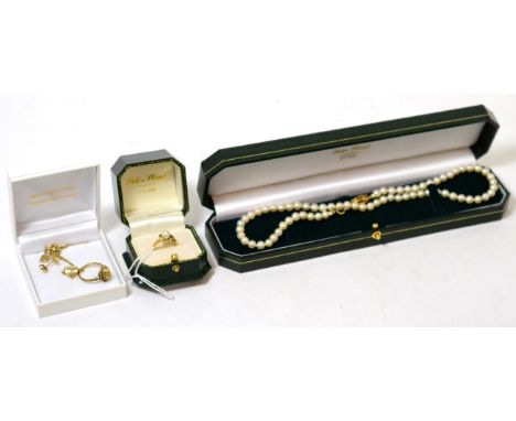 A 9ct gold diamond set heart shaped pendant and earring set, a 9ct gold cultured pearl ring, a 9ct gold citrine ring and a cu