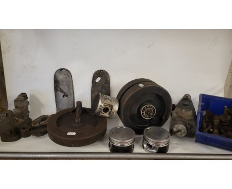 Norton engine spares, to include two crankshafts, three pistons, a valve cover, valves and rockers, a magneto
