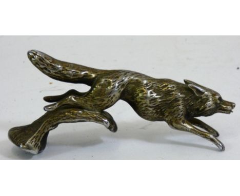Desmo, a nickel fox car mascot, signed, 11.5cm nose to tail.