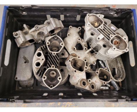A box of Norton engine casing covers and associated parts