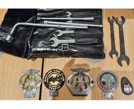 An autojumblers lot, to include a King of the Road lamp, a Mercedes Benz SL tool roll and two Jaguar AF spanners 7/8 and 9/16