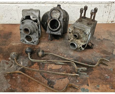 Four Sturmey Archer gearbox levers and three gearbox cases