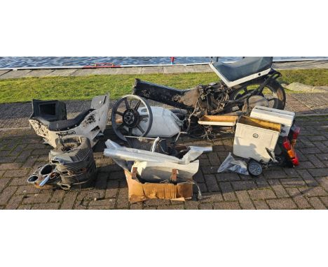 1986 Norton Interpol 2 spares, to include frame number 3244, with rear wheel and part engine, panniers and other parts.
