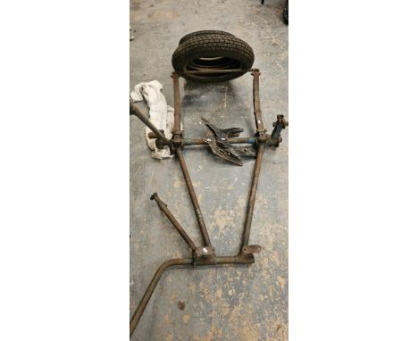 A motorcycle side car chassis, two engine bracket and three tyres