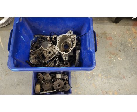 A box of Norton gearbox parts, including a casing and various internals