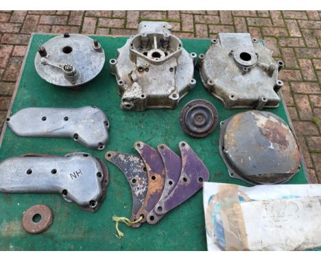 Ariel motorcycle parts, including timing cases, front engine plates, clutch dome, two AMC crankcase halves