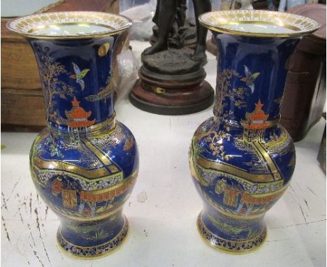 A Crown Staffordshire covered trinket box, decorated with flowers, and a pair of Carlton ware W &amp; R vases, decorated with