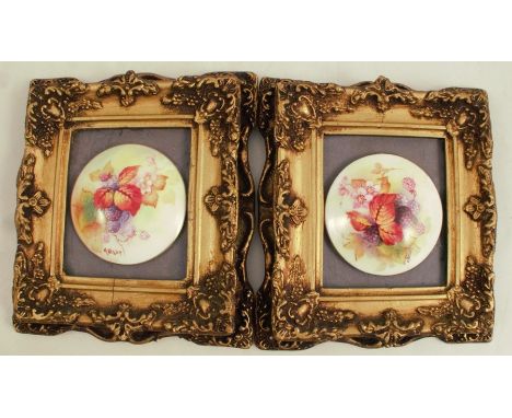 Two Royal Worcester circular domed plaques, decorated with autumnal fruits and leaves by Kitty Blake, dated 1936 and 1938, di
